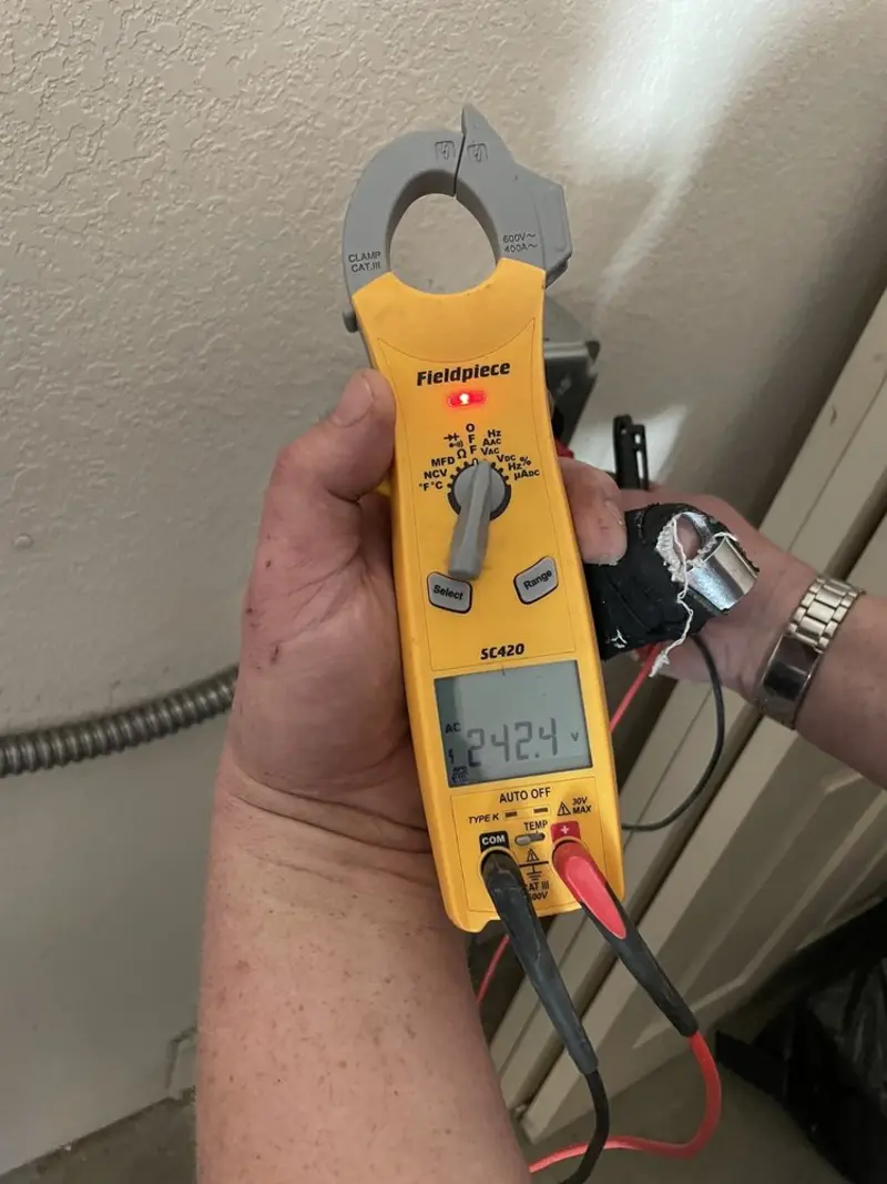 Voltage testing with clamp meter during Recessed Lighting Installation in Mount Laurel